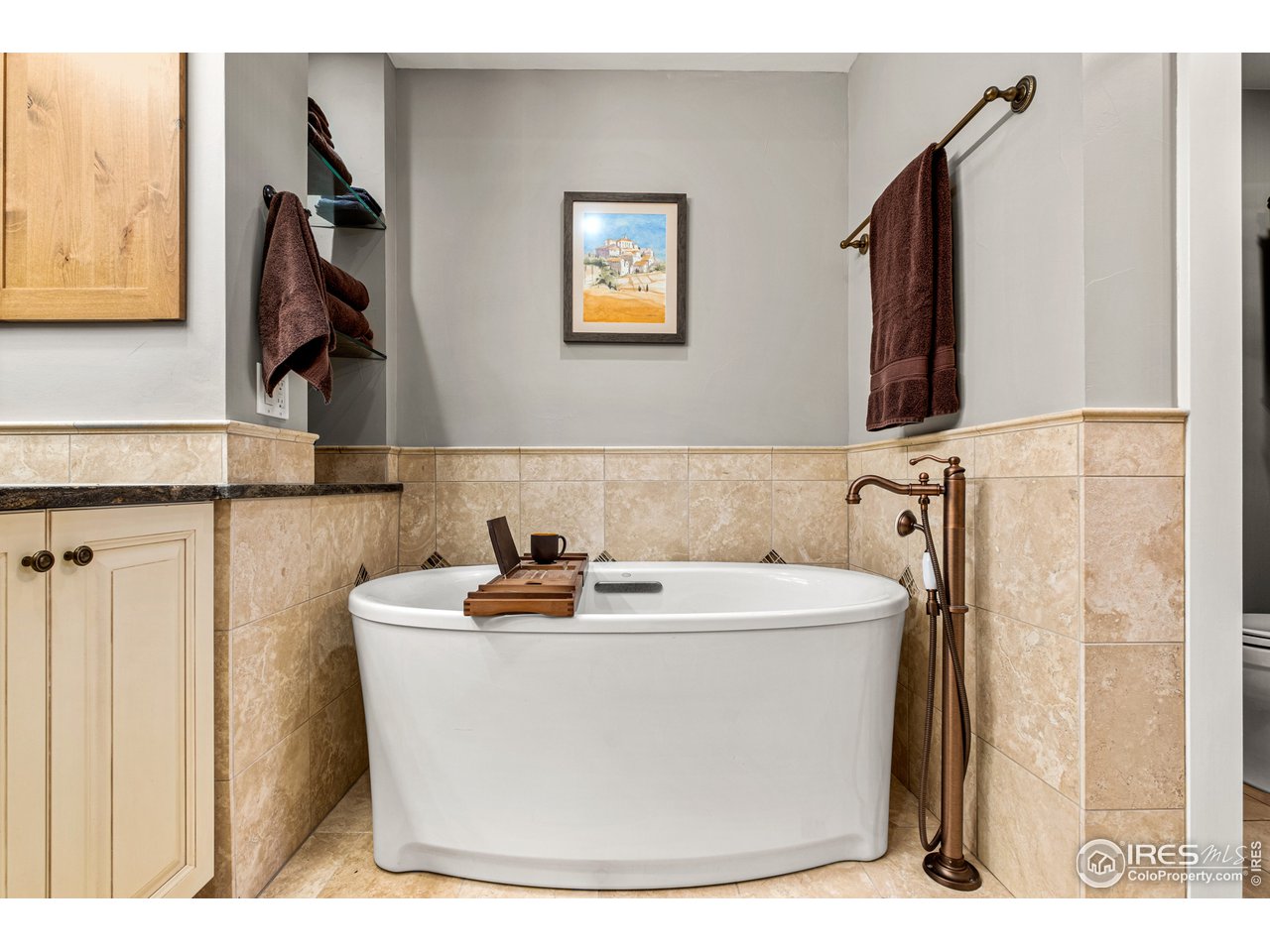 901 Pearl Street, Unit 202 Boulder, CO 80302 - Photo 25 of 35 a white bath tub sitting next to a bathroom