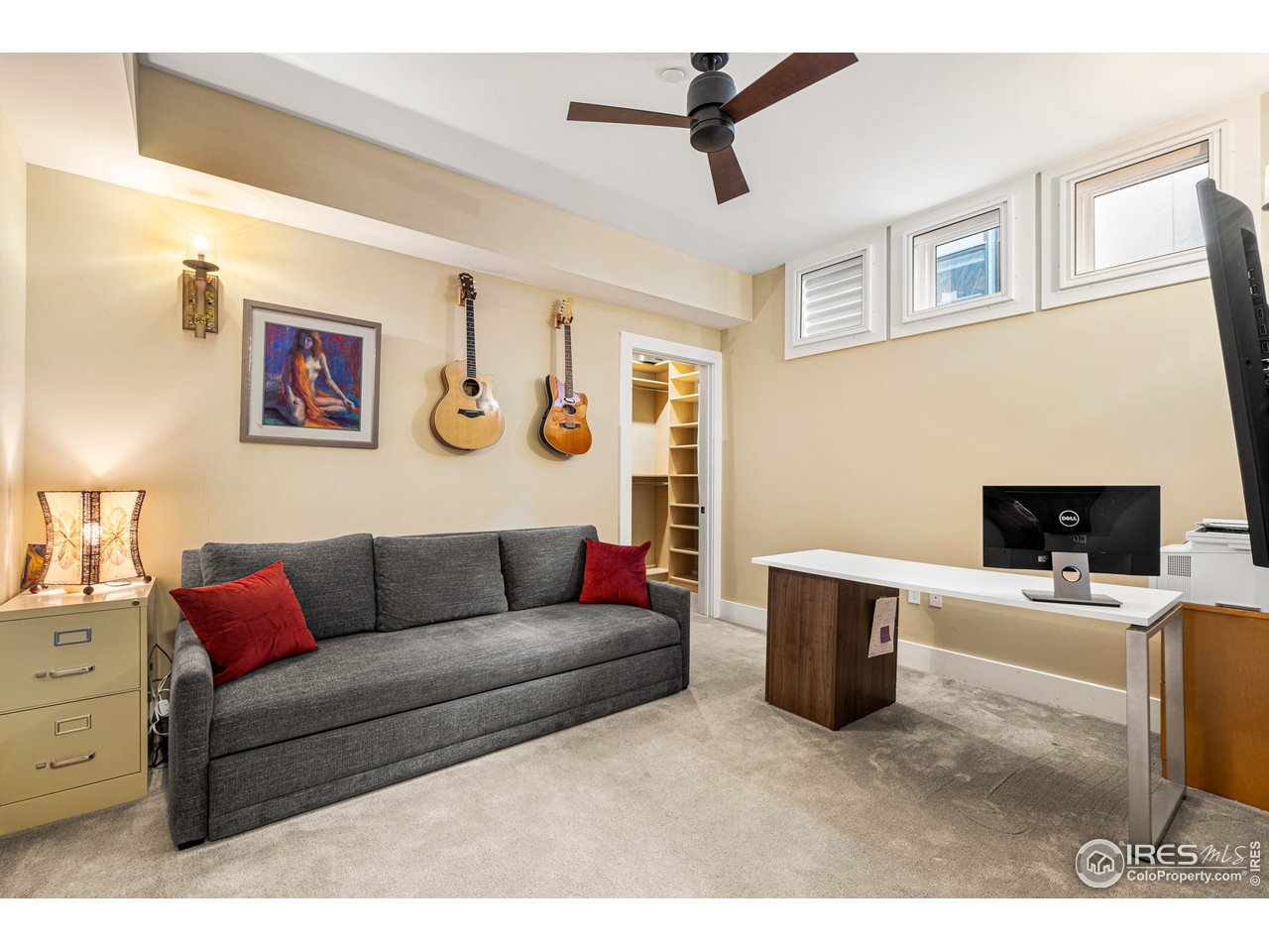 901 Pearl Street, Unit 202 Boulder, CO 80302 - Photo 28 of 35 a living room with furniture and a flat screen tv