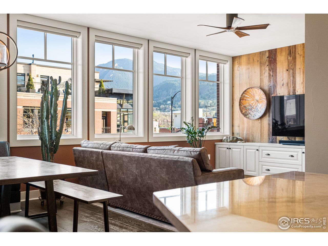 901 Pearl Street, Unit 202 Boulder, CO 80302 - Photo 5 of 35 a living room with large window