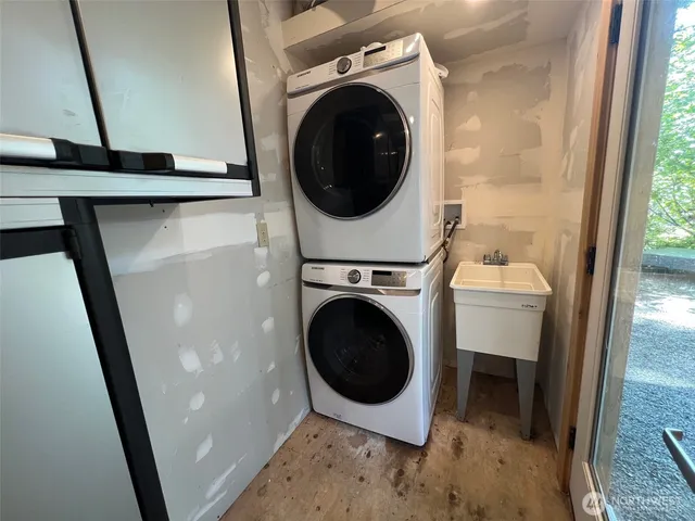 a utility room with dryer and washer