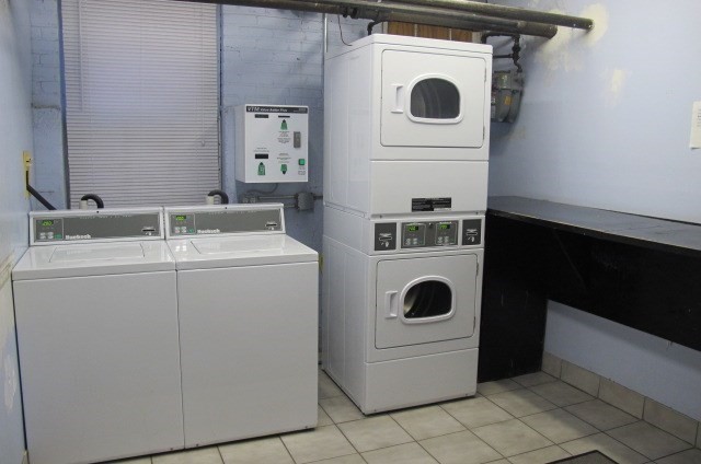 33 Walbridge Street, Unit 18 Boston, MA 02134 - Photo 8 of 13 a utility room with dryer and washer