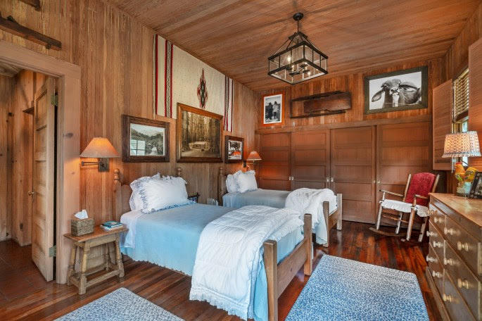 1555 East Valley Road Santa Barbara, CA 93108 - Photo 12 of 18 a living room with furniture and a chandelier