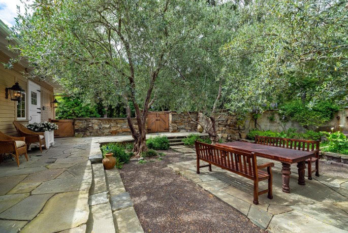 1555 East Valley Road Santa Barbara, CA 93108 - Photo 13 of 18 a view of a patio with chairs and a table