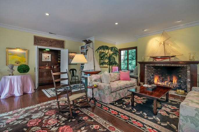 1555 East Valley Road Santa Barbara, CA 93108 - Photo 18 of 18 a living room with furniture and a fireplace