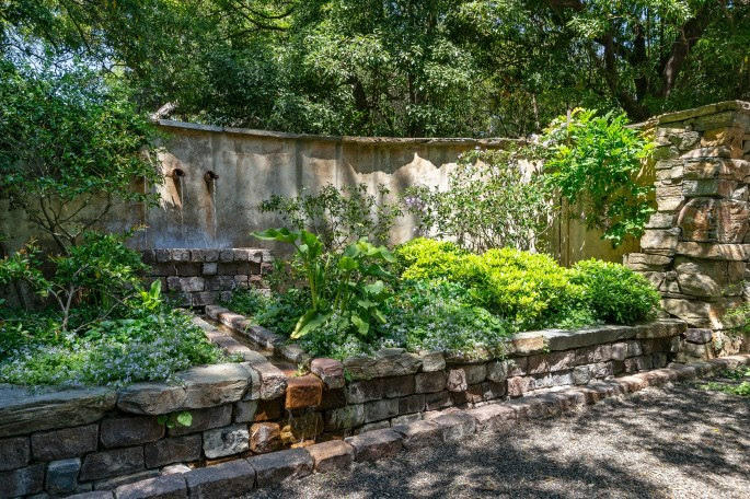 1555 East Valley Road Santa Barbara, CA 93108 - Photo 9 of 18 a garden with plants in front of it