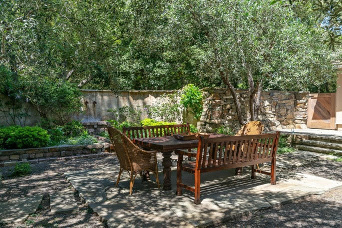 1555 East Valley Road Santa Barbara, CA 93108 - Photo 10 of 18 a view of a wooden deck with furniture