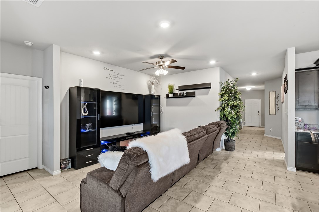 2009 Chief Street Bryan, TX 77807 - Photo 5 of 27 a living room with furniture and a flat screen tv