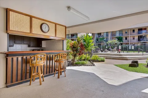 a view of a street with sitting area