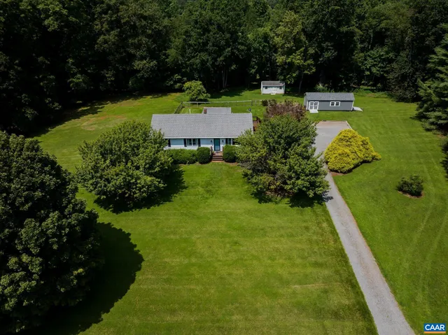 a view of a garden with an outdoor space