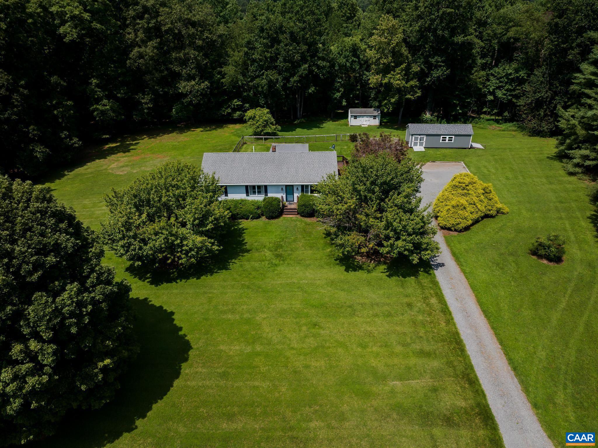 a view of a garden with an outdoor space