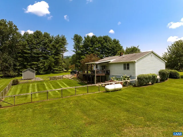 a view of a house with swimming pool