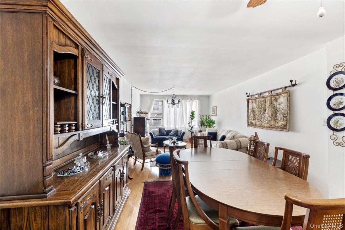 4265 Webster Avenue, Unit 7C Bronx, NY 10470 - Photo 14 of 22 a view of a dining room with furniture and window
