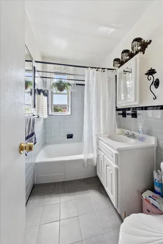 a bathroom with a bathtub sink and toilet