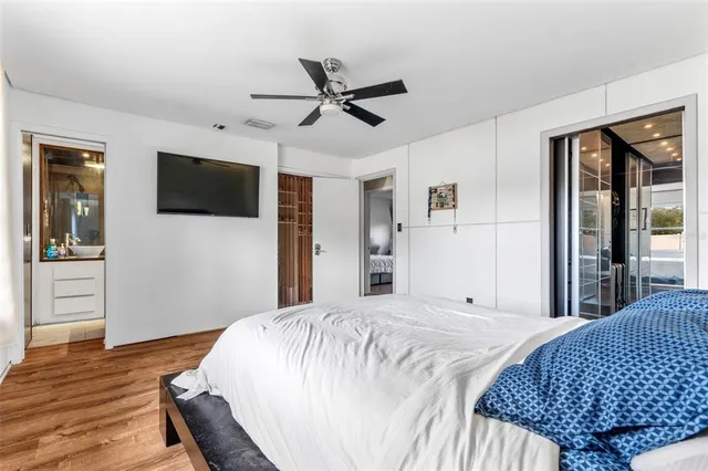 a bathroom with a glass shower door