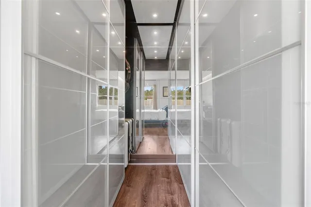 a en suite bathroom with a sink and a mirror