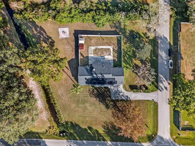 a view of swimming pool with a outdoor seating
