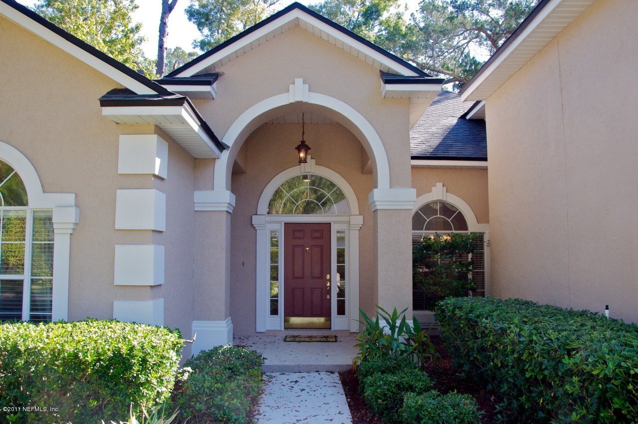 860 Mill Stream Road Ponte Vedra, FL 32082 - Photo 20 of 28 a front view of a house with a yard