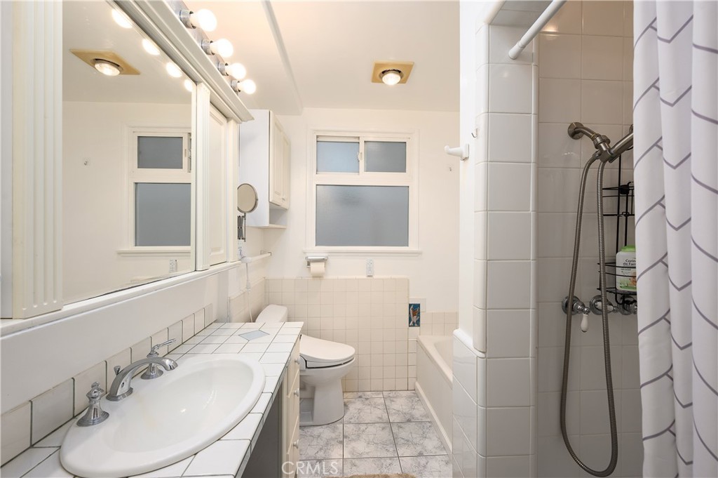 532 The Strand Hermosa Beach, CA 90254 - Photo 11 of 11 a bathroom with a sink toilet and shower