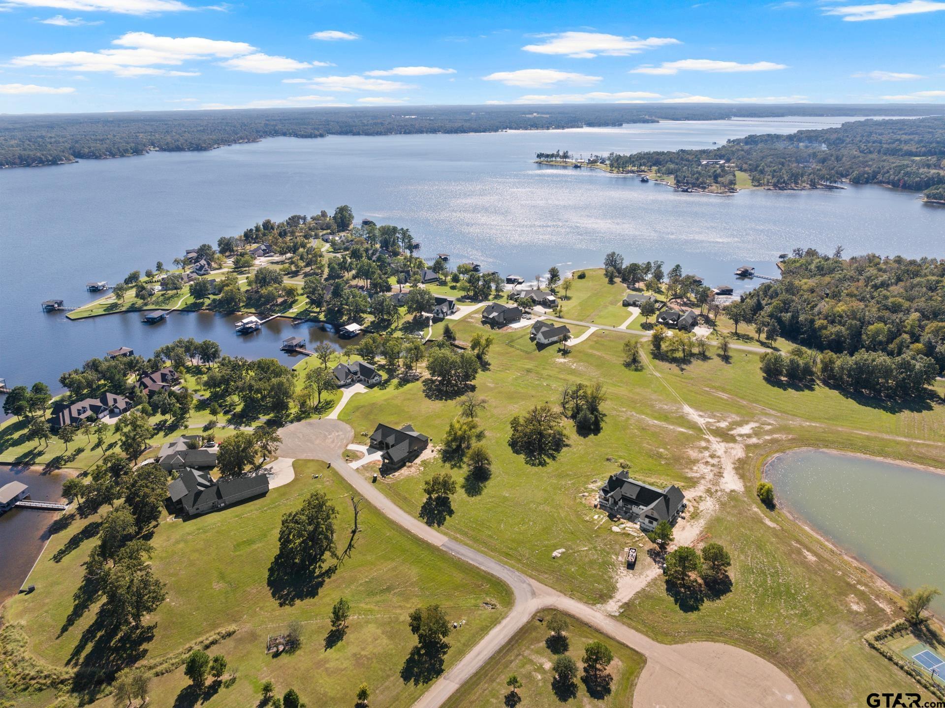 Lot 26 Private Road Mount Pleasant, TX 75455 - Photo 12 of 20 an aerial view of a residential houses with outdoor space