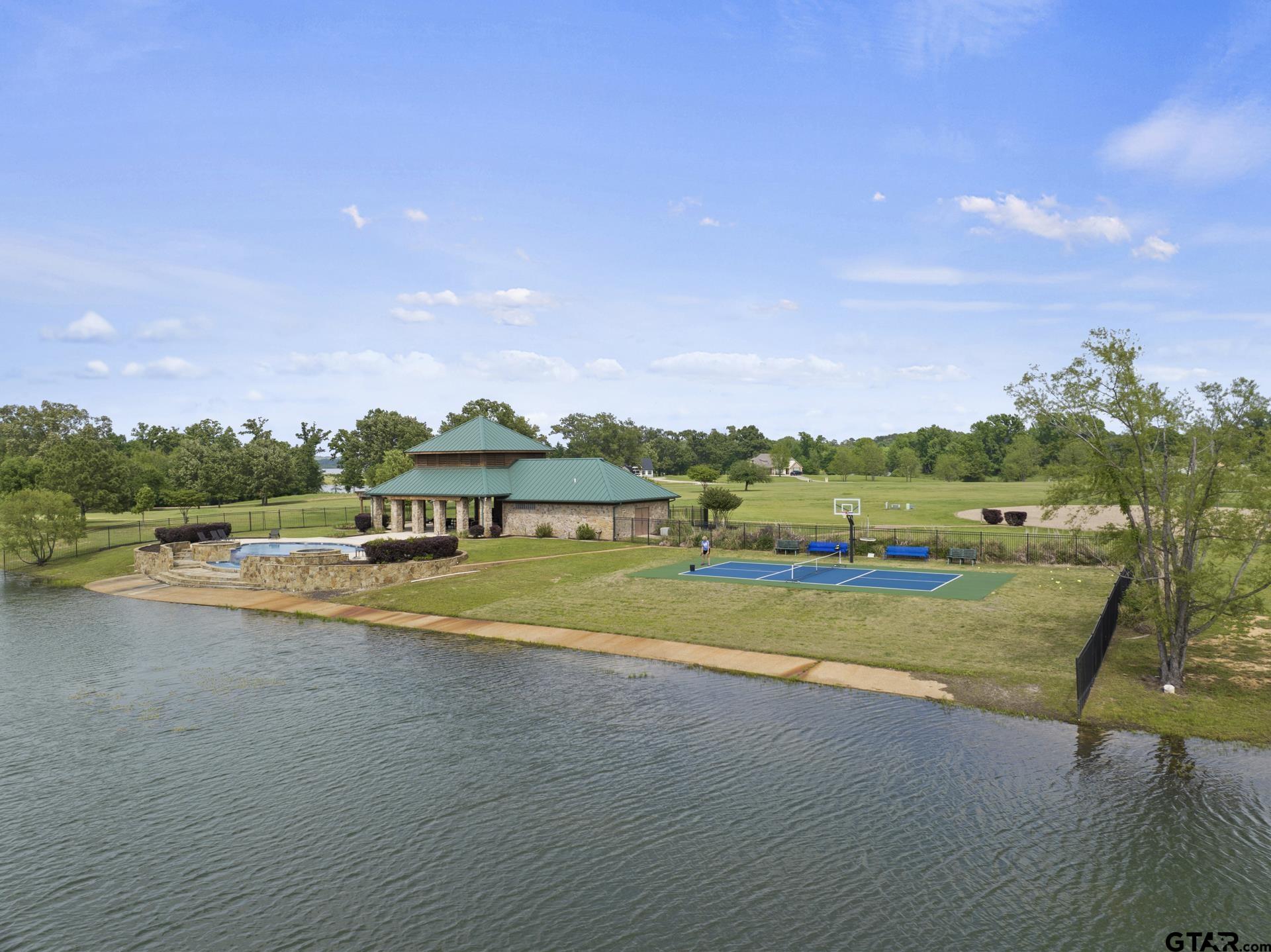 Lot 26 Private Road Mount Pleasant, TX 75455 - Photo 17 of 20 a view of a house with a big yard
