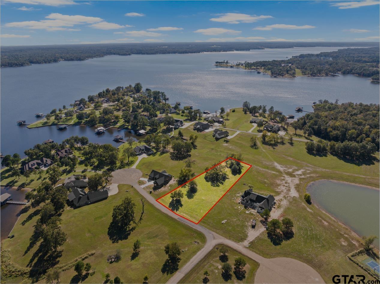 Lot 26 Private Road Mount Pleasant, TX 75455 - Photo 2 of 20 an aerial view of a house with a yard