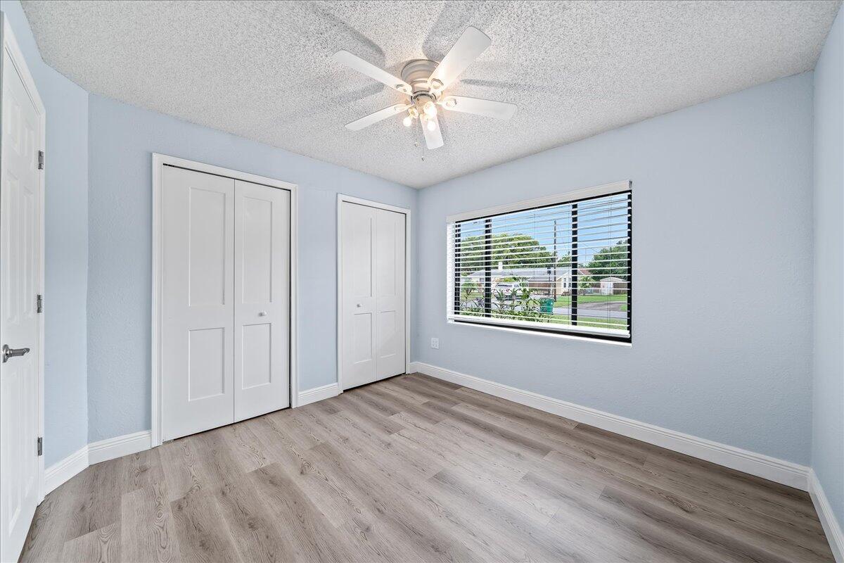 124 Monaco Road Melbourne, FL 32904 - Photo 13 of 24 a view of an empty room with a window