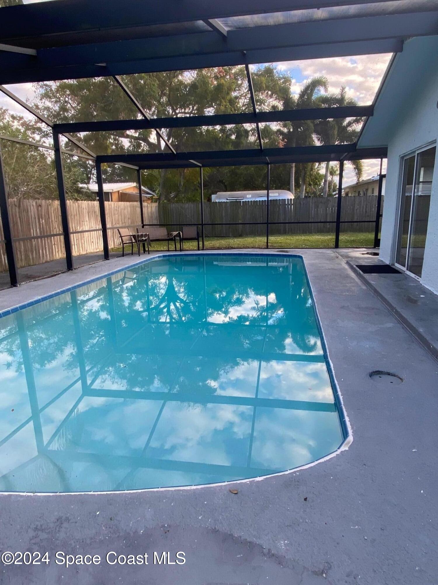 124 Monaco Road Melbourne, FL 32904 - Photo 23 of 24 a view of a swimming pool