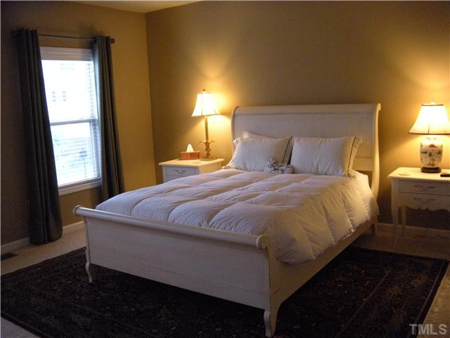 1326 Rodessa Run Raleigh, NC 27607 - Photo 9 of 20 The perfect place to relax . . . boasting a trey ceiling with ceiling fan, custom paint, double windows, and a walk-in closet. Master Bedroom