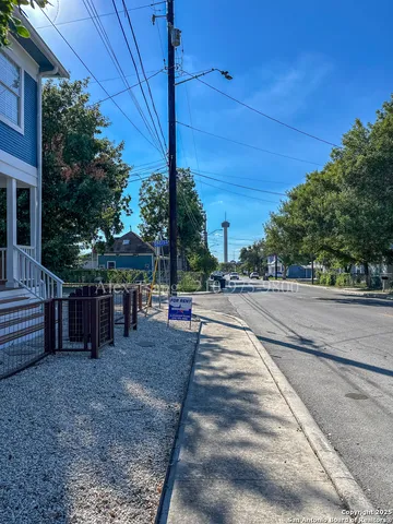 a view of street with sitting area