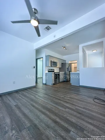 a view of kitchen and livingroom