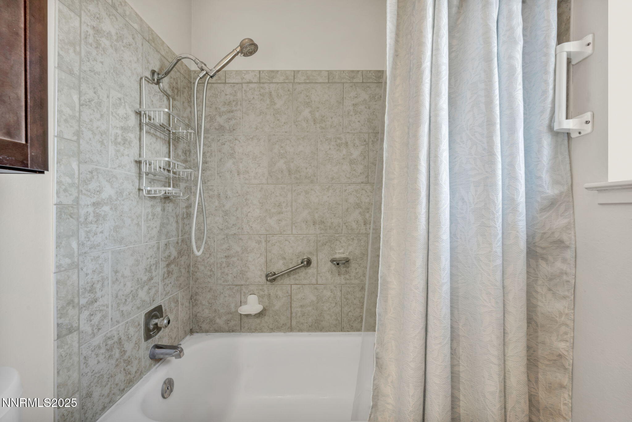 836 E Street Fernley, NV 89408 - Photo 26 of 53 a bathroom with a bathtub and shower