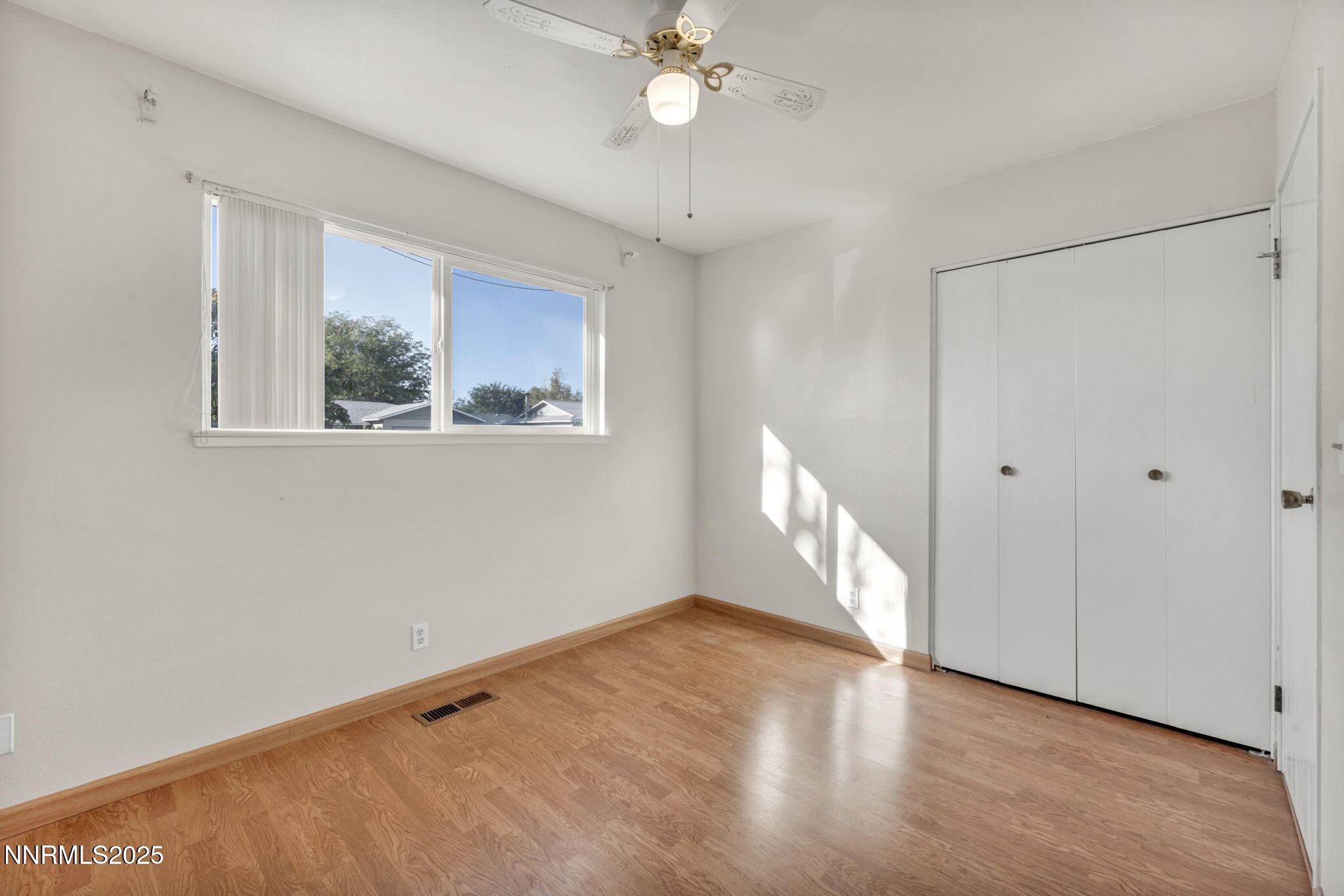 836 E Street Fernley, NV 89408 - Photo 34 of 53 a view of an empty room with a window