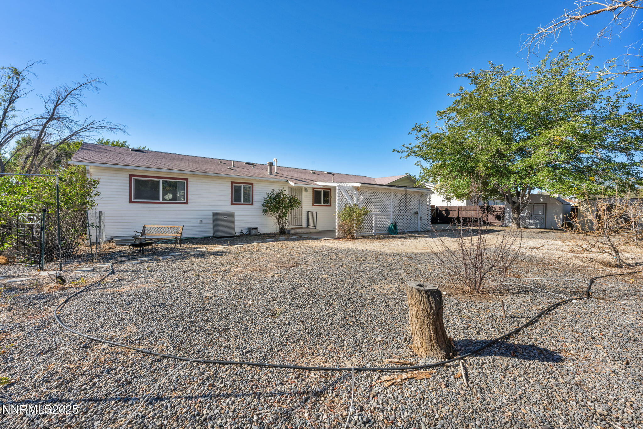 836 E Street Fernley, NV 89408 - Photo 40 of 53 a view of a house with a yard