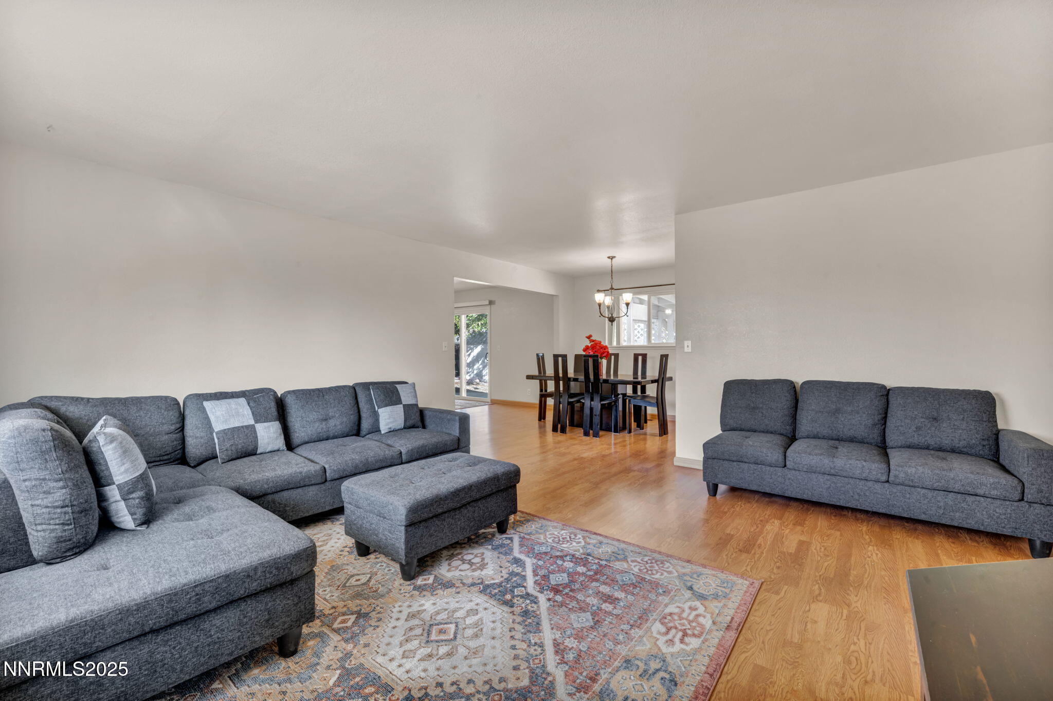 836 E Street Fernley, NV 89408 - Photo 6 of 53 a living room with furniture and kitchen view