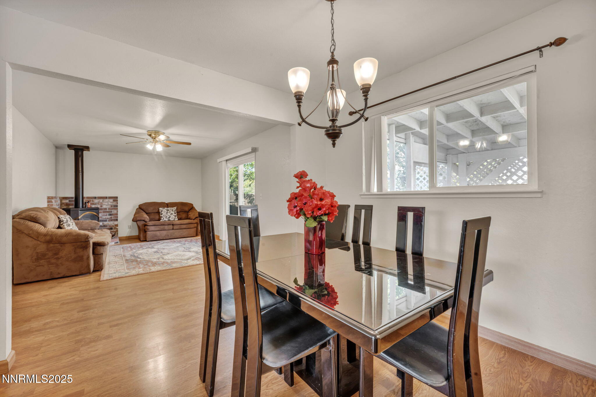 836 E Street Fernley, NV 89408 - Photo 10 of 53 a view of a dining room with furniture and chandelier
