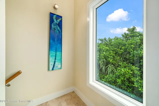 a picture of a wall with white wall and picture