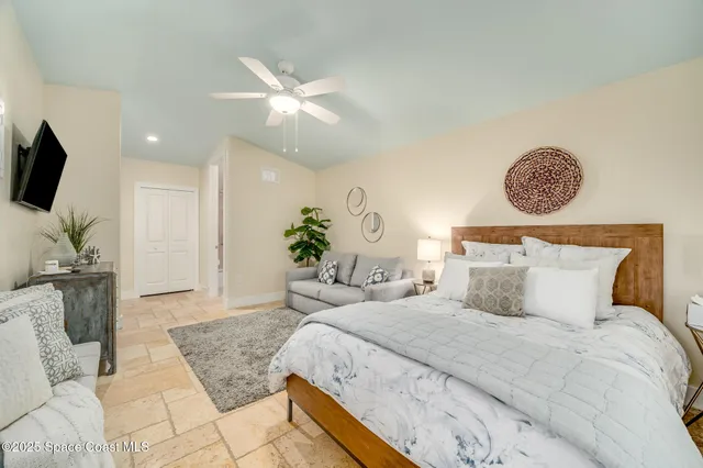a kitchen with a sink cabinets and a window