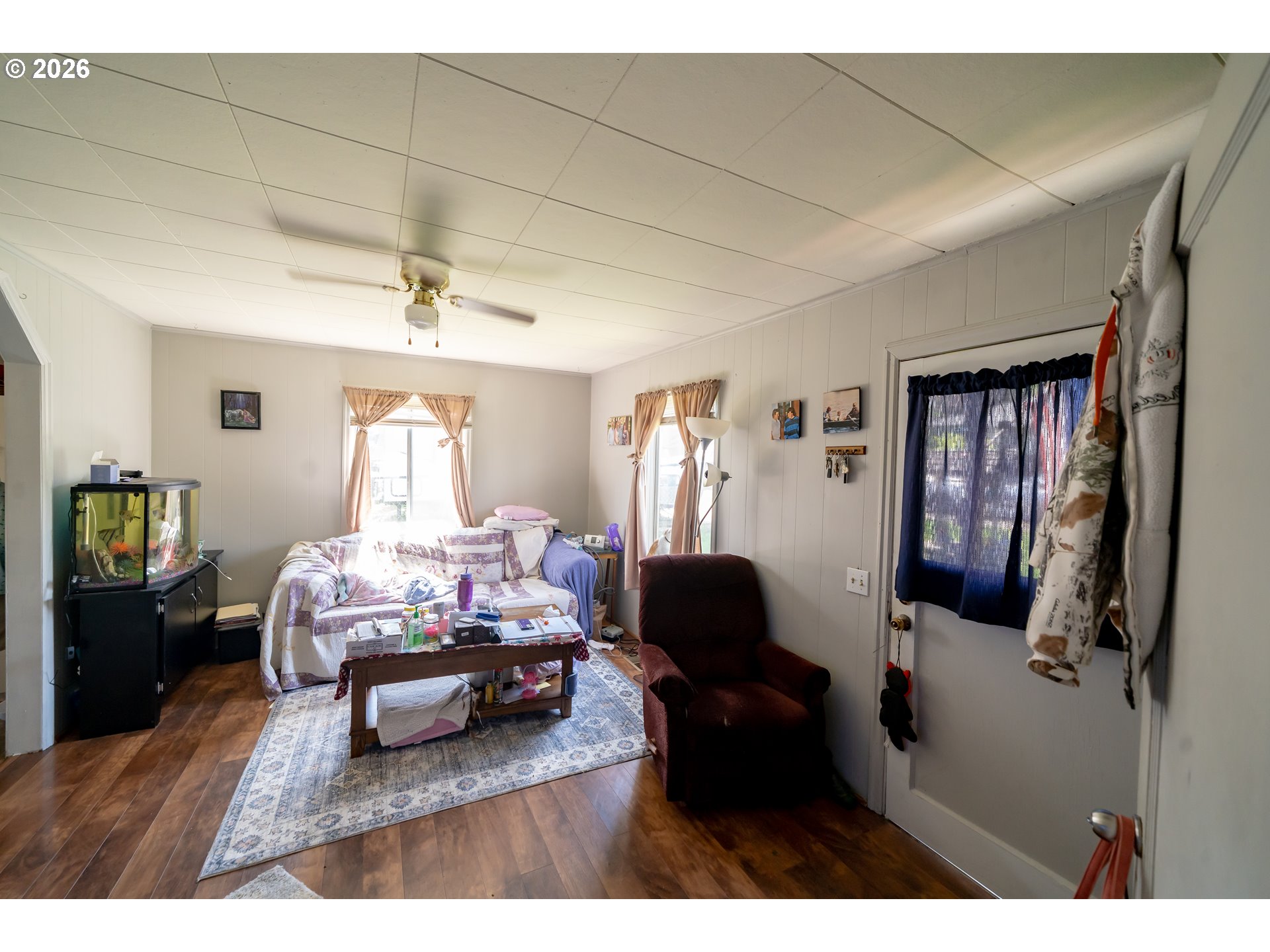 1450 Southwest 9th Street Dallas, OR 97338 - Photo 3 of 15 a bedroom with furniture and a wooden floor