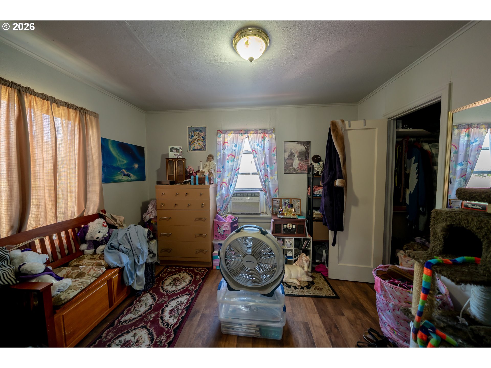 1450 Southwest 9th Street Dallas, OR 97338 - Photo 7 of 15 a living room with furniture a window and gym equipment