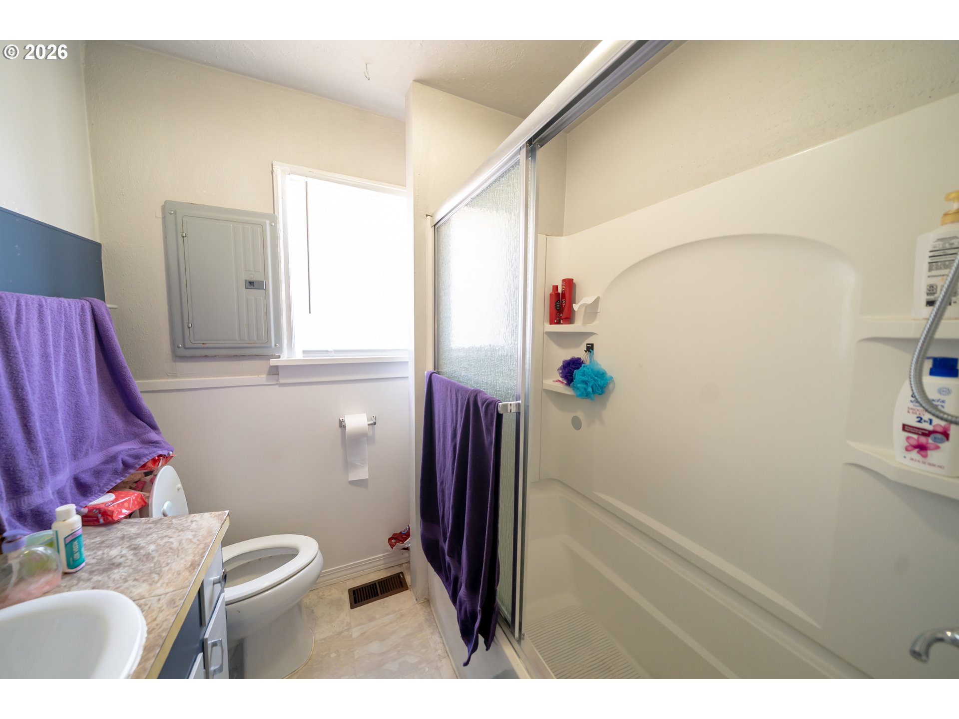 1450 Southwest 9th Street Dallas, OR 97338 - Photo 8 of 15 a bathroom with a sink toilet and shower