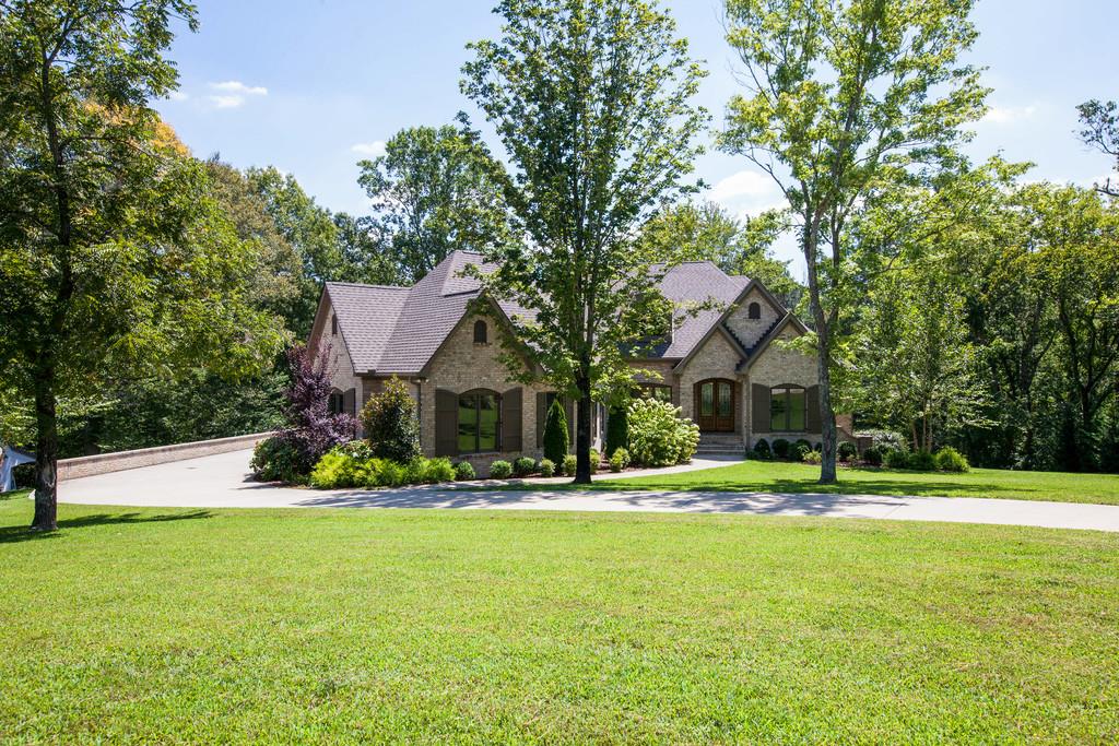 5939 Greenbriar Road Franklin, TN 37064 - Photo 1 of 30 a front view of a house with a yard