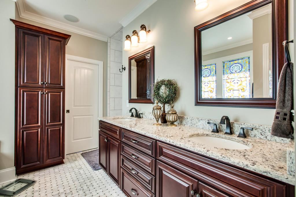 5939 Greenbriar Road Franklin, TN 37064 - Photo 13 of 30 a bathroom with a granite countertop sink and a mirror