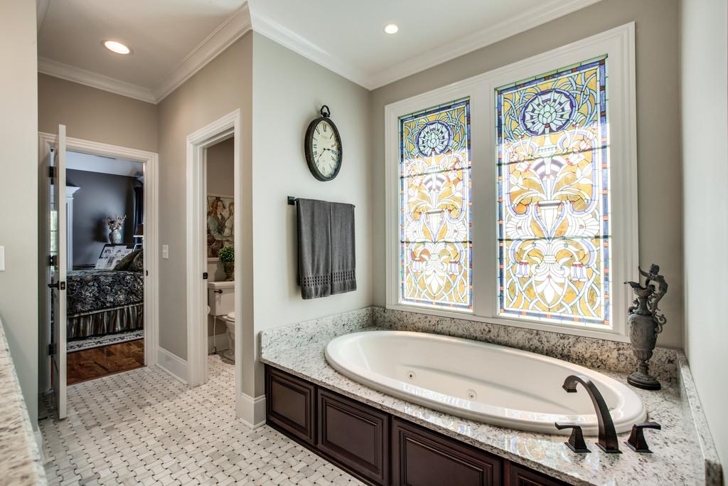 5939 Greenbriar Road Franklin, TN 37064 - Photo 14 of 30 a bath tub sitting next to a window