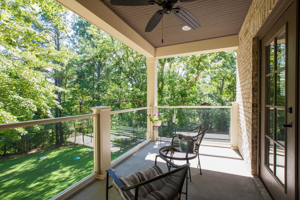 5939 Greenbriar Road Franklin, TN 37064 - Photo 16 of 30 a view of a chair and tables in the balcony