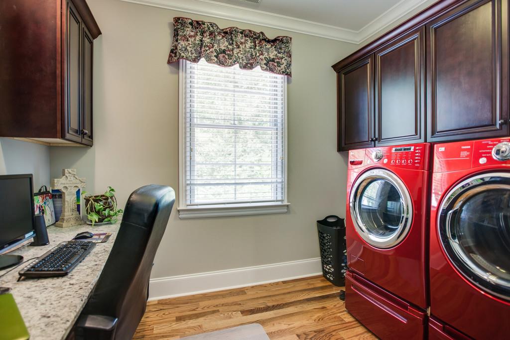 5939 Greenbriar Road Franklin, TN 37064 - Photo 19 of 30 a view of a room with washer and dryer