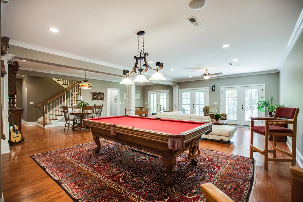 5939 Greenbriar Road Franklin, TN 37064 - Photo 20 of 30 a living room with furniture pool table and a rug