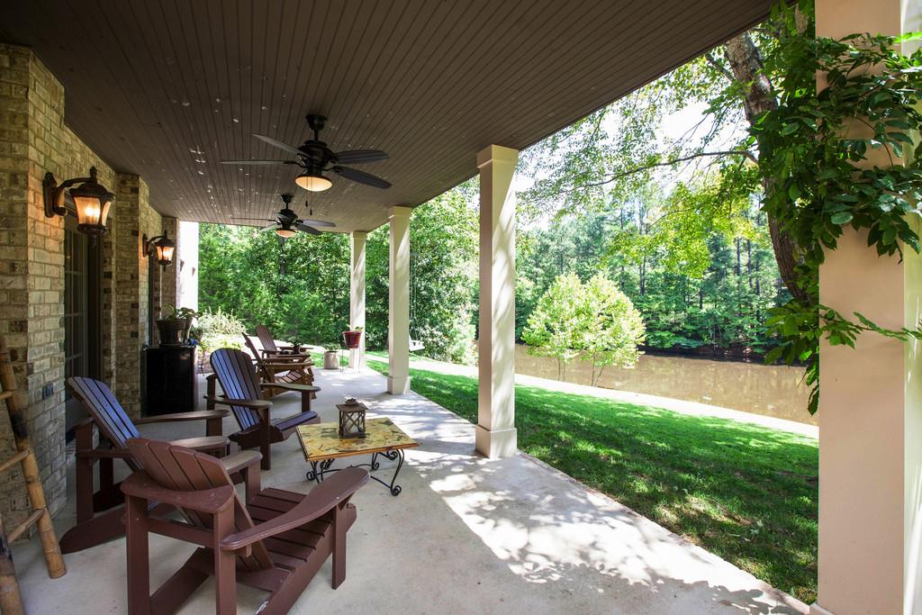 5939 Greenbriar Road Franklin, TN 37064 - Photo 24 of 30 a living room with patio furniture and garden