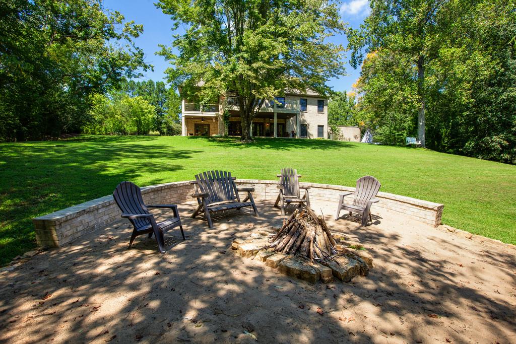 5939 Greenbriar Road Franklin, TN 37064 - Photo 28 of 30 a view of a table and chairs in the garden