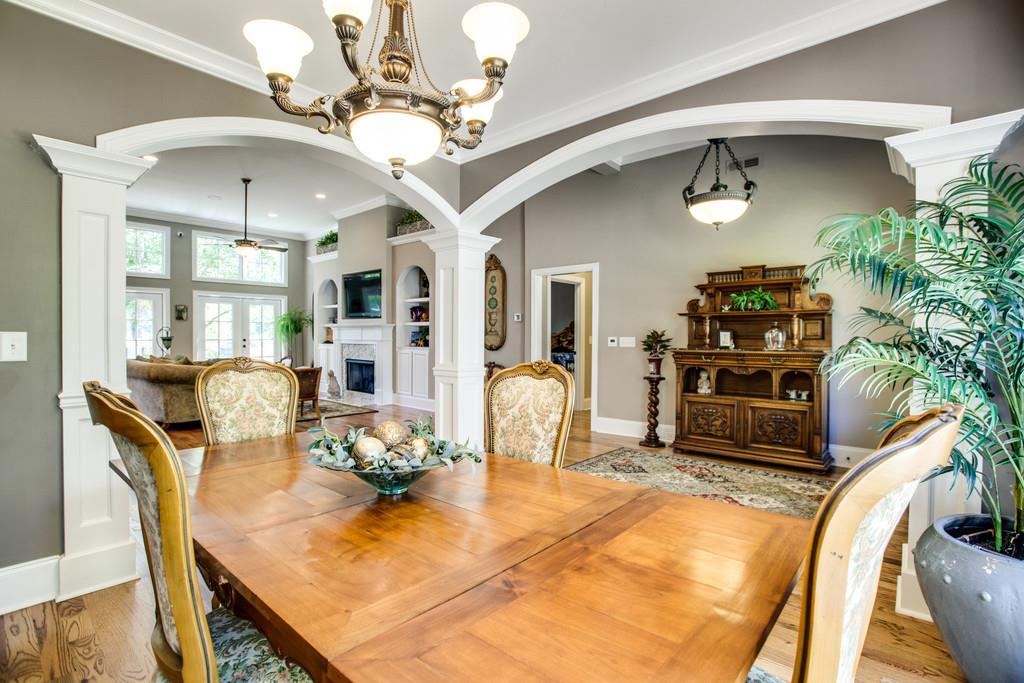 5939 Greenbriar Road Franklin, TN 37064 - Photo 4 of 30 a view of a dining room with furniture and a chandelier
