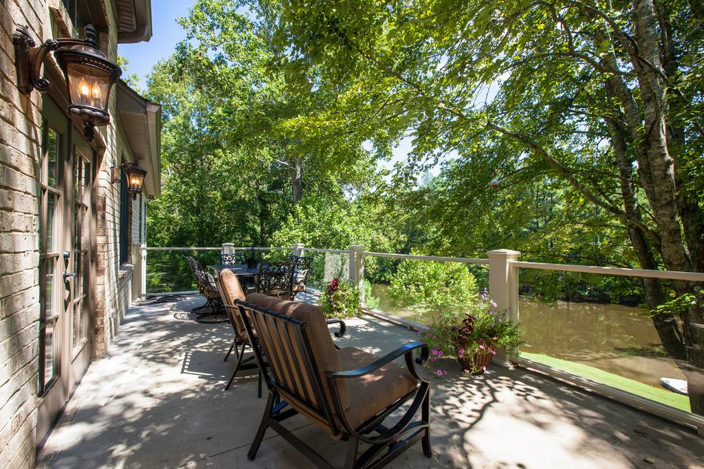 5939 Greenbriar Road Franklin, TN 37064 - Photo 6 of 30 a view of a patio with table and chairs and potted plants